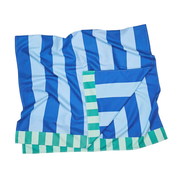 Blue, white, and green striped blanket on a white background