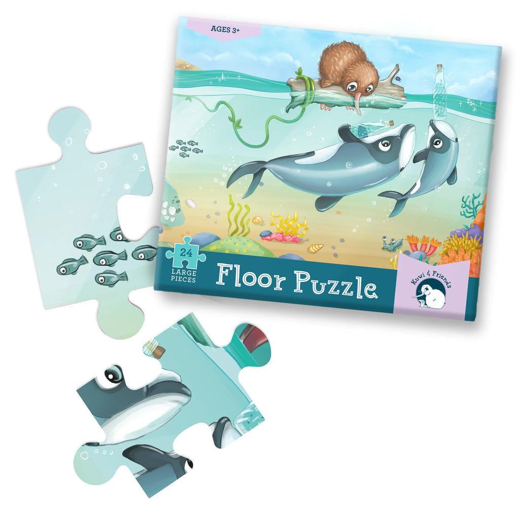 Floor puzzle with ocean-themed pieces and packaging on a white background