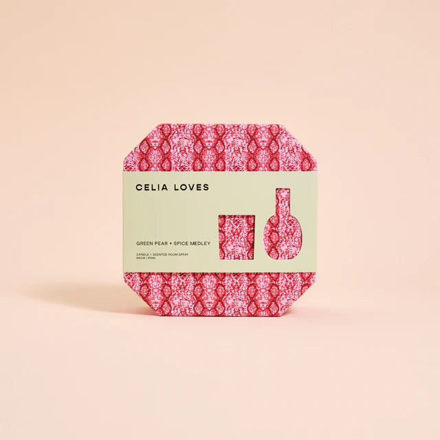 Celia Loves product packaging with pink and green design on a beige background