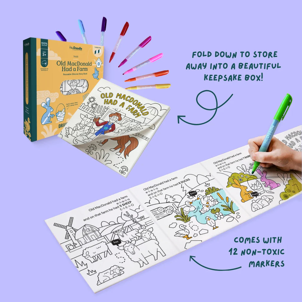 Coloring book with farm illustrations and markers on a purple background
