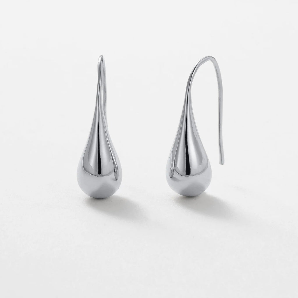Pair of silver teardrop earrings on a white background