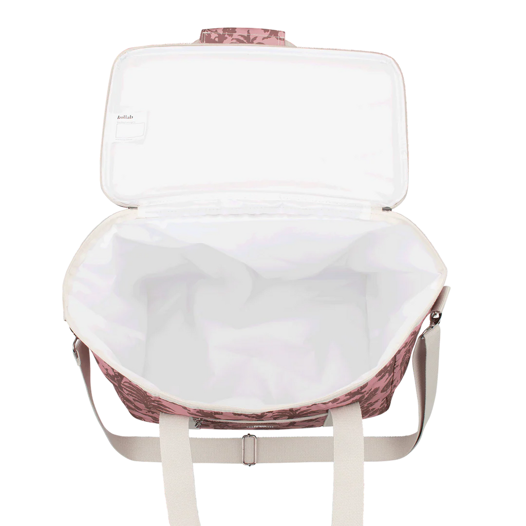 Inside view of cooler bag with pink floral pattern on a white background