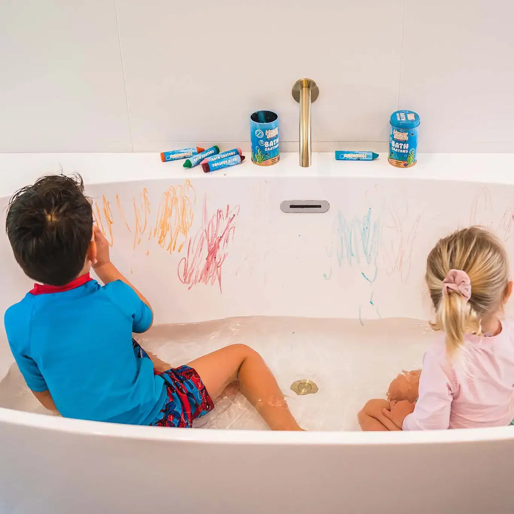 children in a bath drawing with bath crayons
