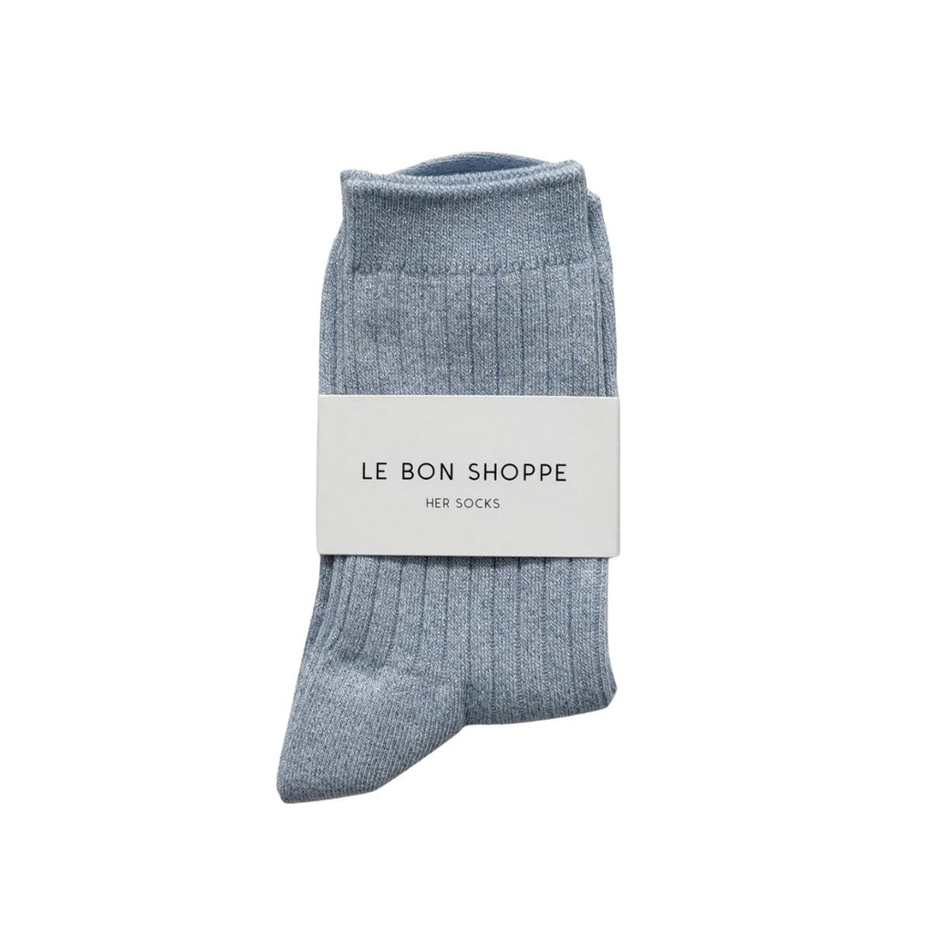 Blue sock with a white label on a white background