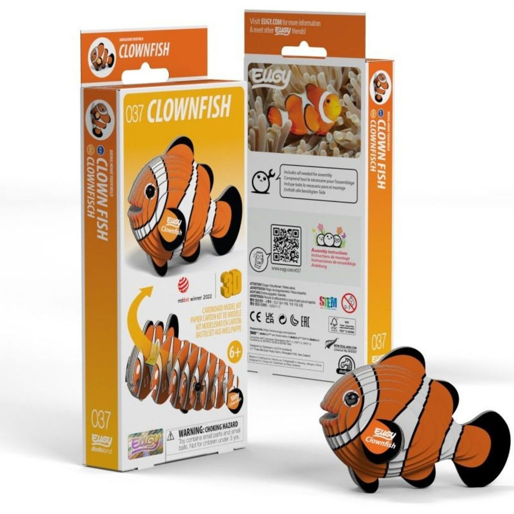 Toy clownfish with packaging on a white background