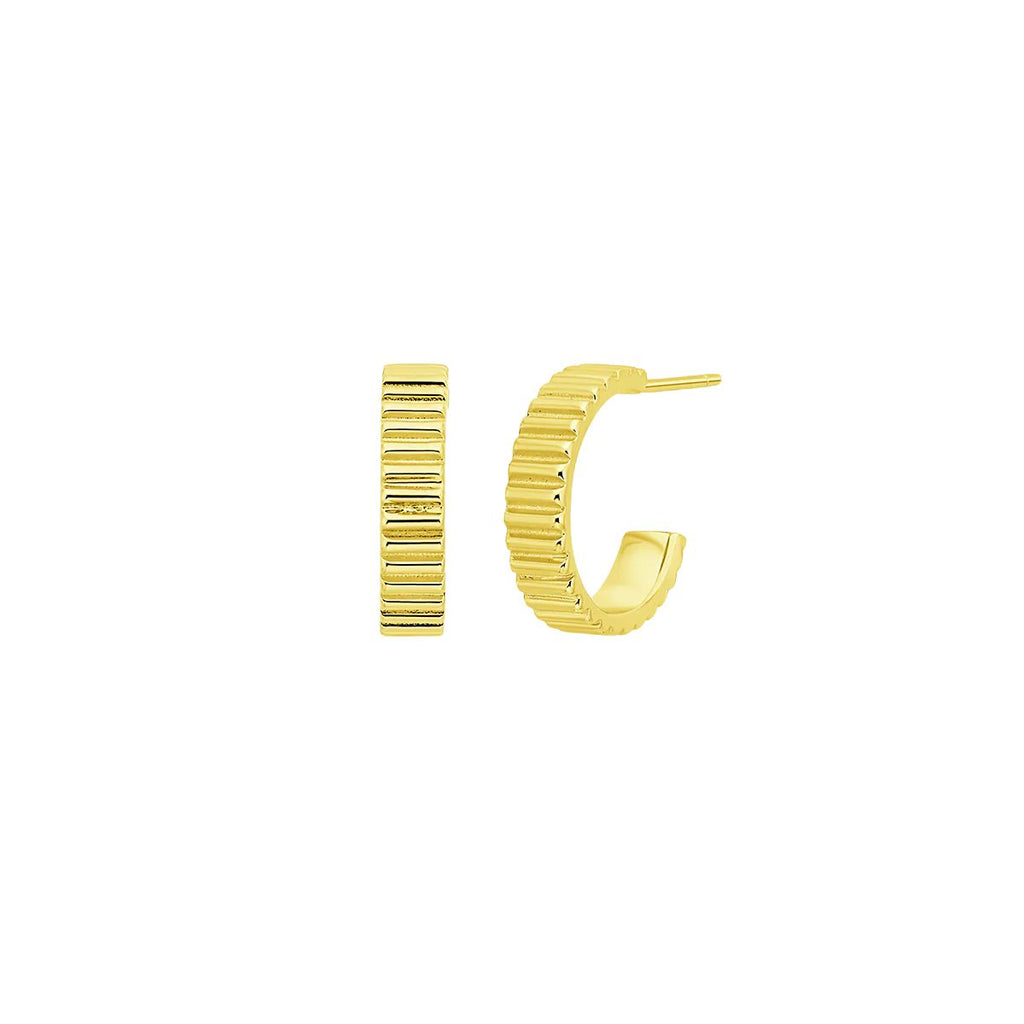 Gold hoop earrings on a white background