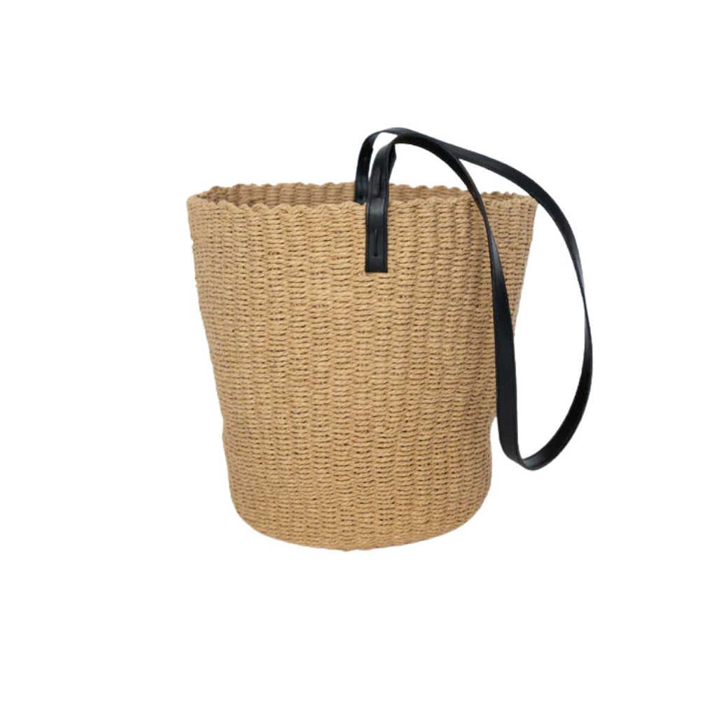 Woven basket with a black handle on a white background