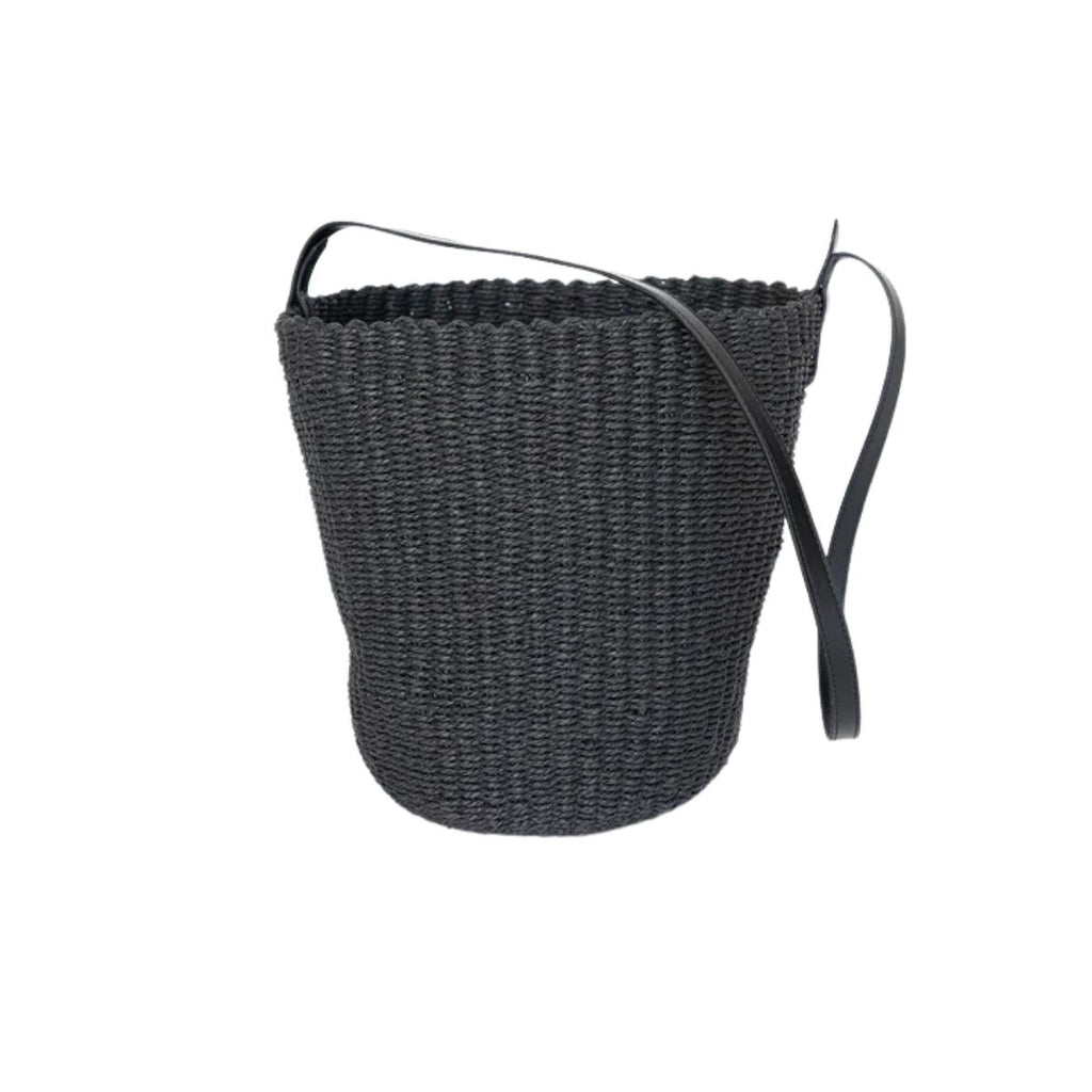 Black woven basket with a handle on a white background