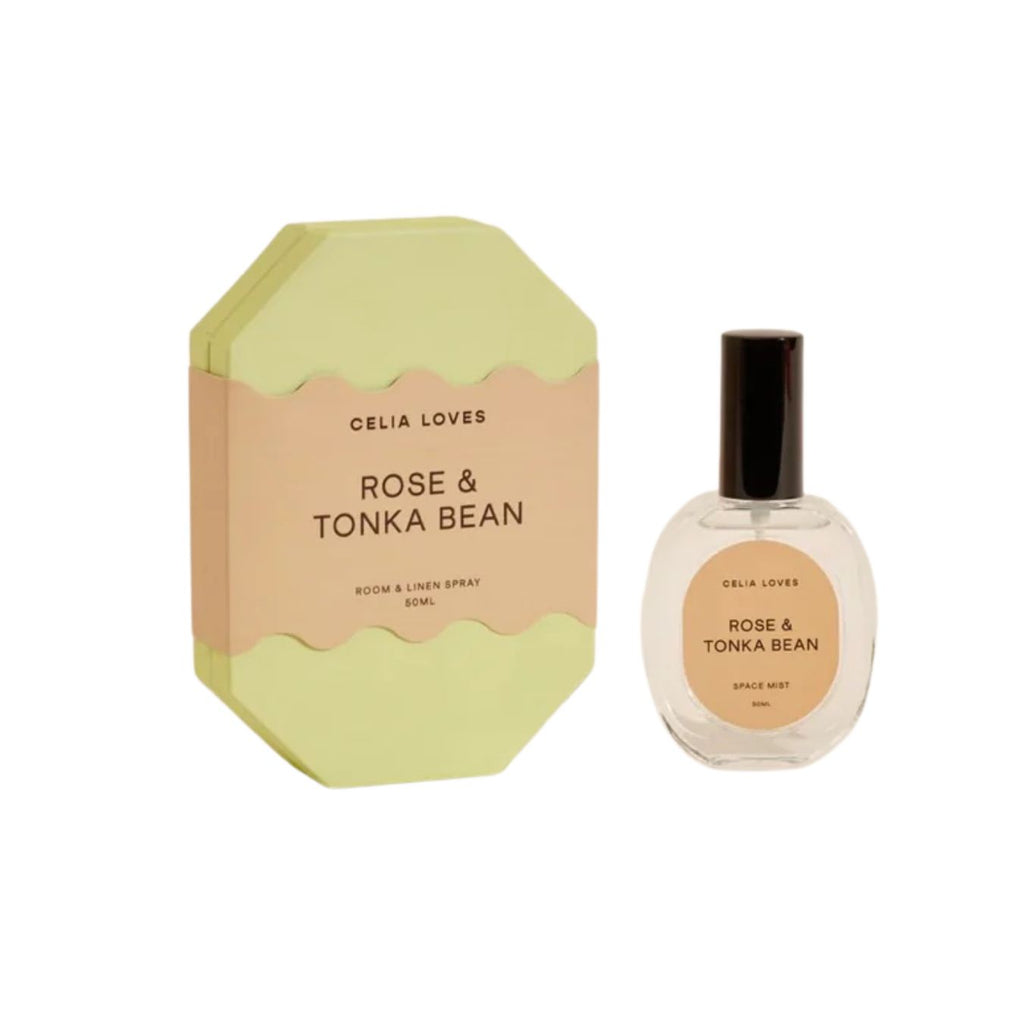 Celia Loves Rose & Tonka Bean room spray and bottle on a white background