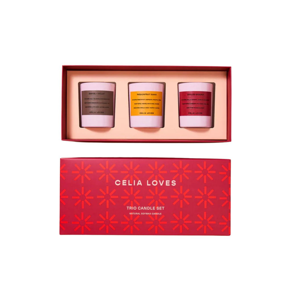 Three candles in a box with 'Celia Loves' branding on a white background