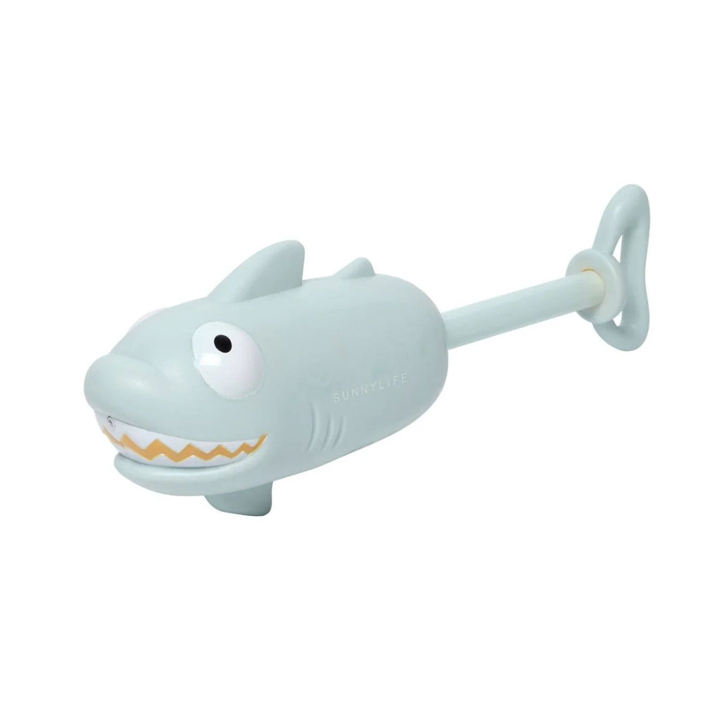 Shark-shaped toy with a handle on a white background