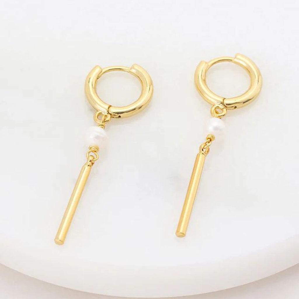 Gold hoop earrings with bar pendants on a white background