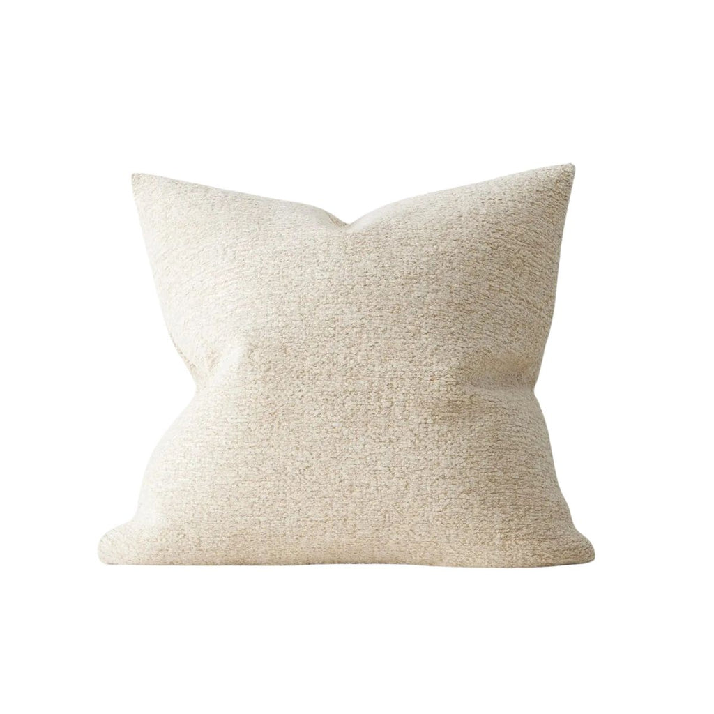 Beige pillow on a white background