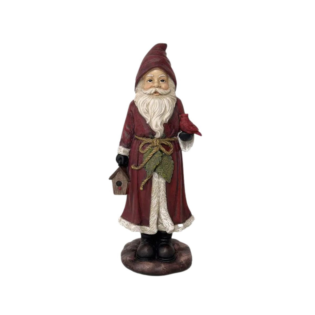 Decorative santa figurine with a red coat and white beard on a white background