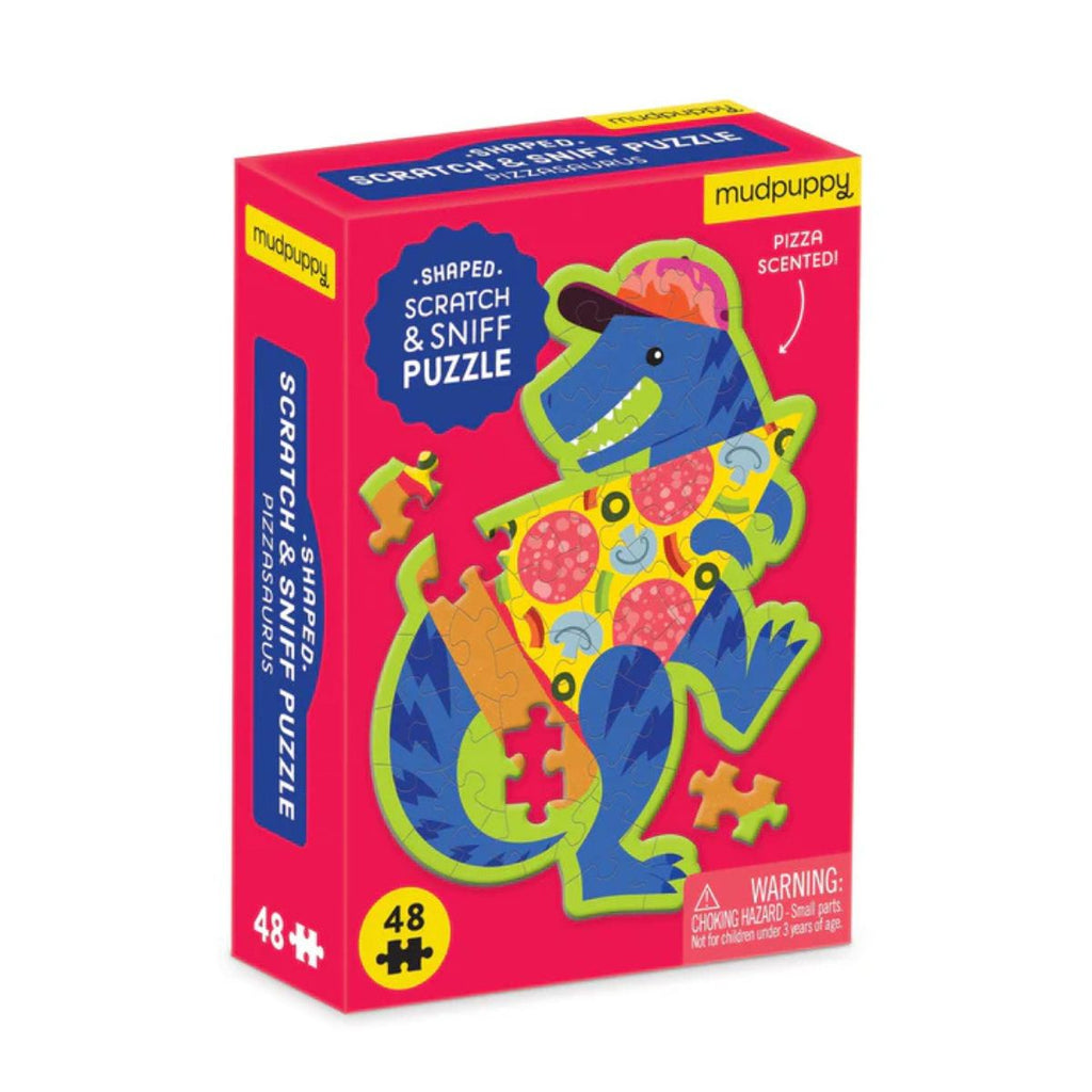 Mudpuppy dinosaur-shaped scratch and sniff puzzle packaging on a white background