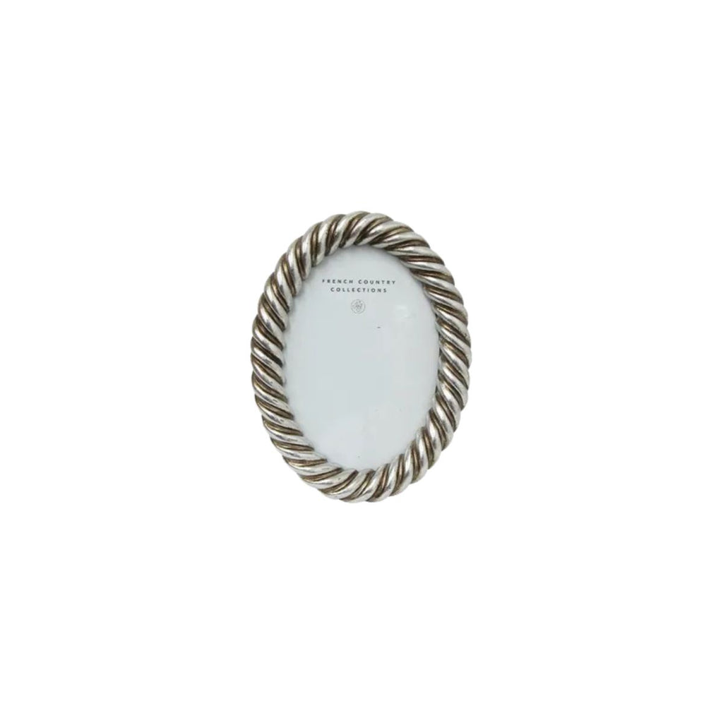 Silver oval photo frame on a white background