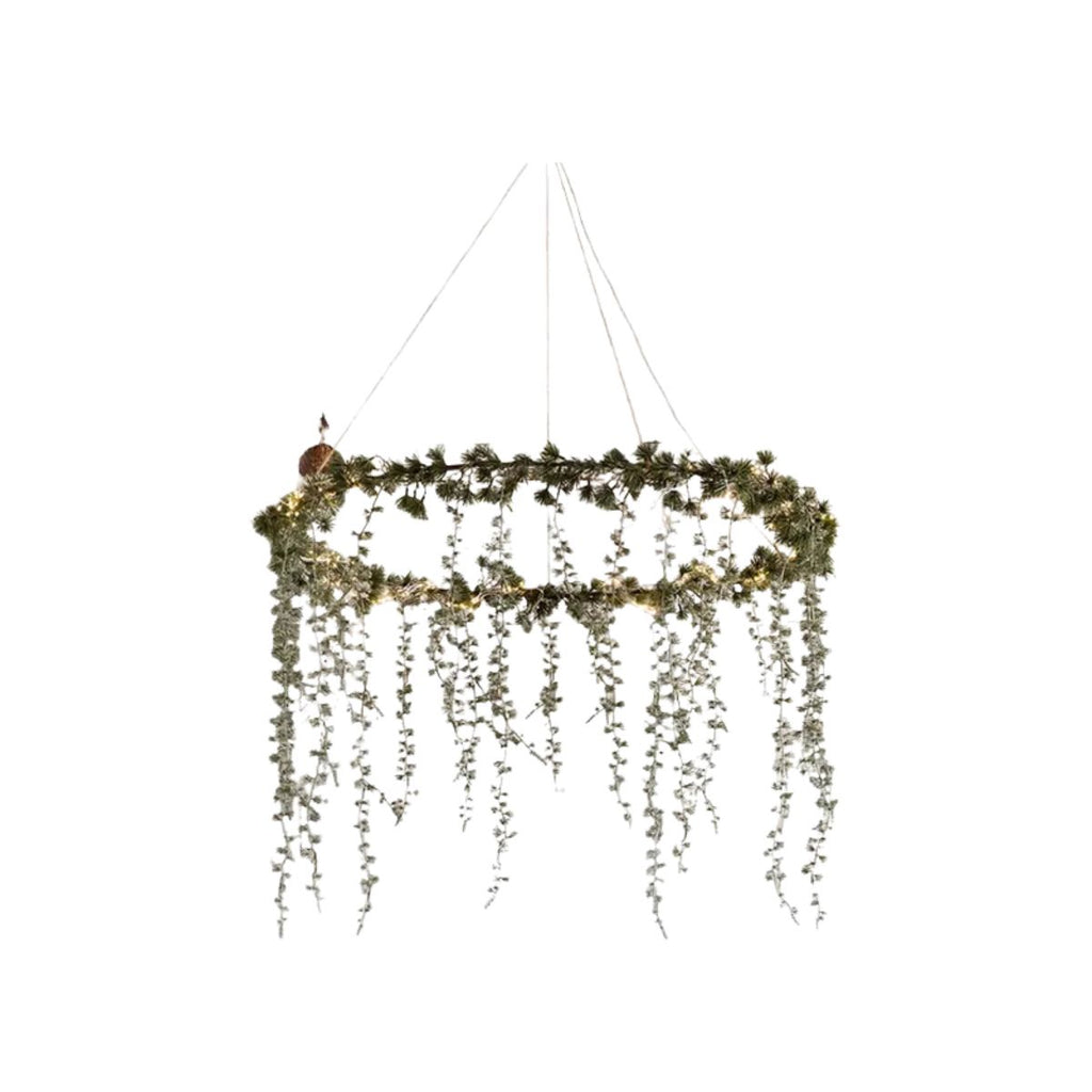 Hanging decorative wreath with greenery on a white background