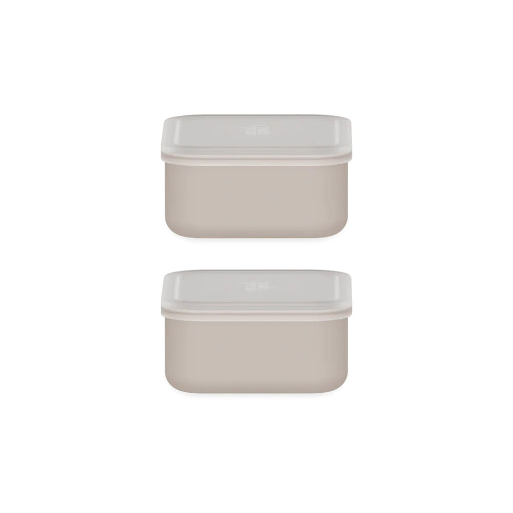 Two beige rectangular containers with white lids on a white background
