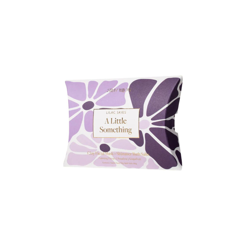 Packaged product with purple floral design on a white background