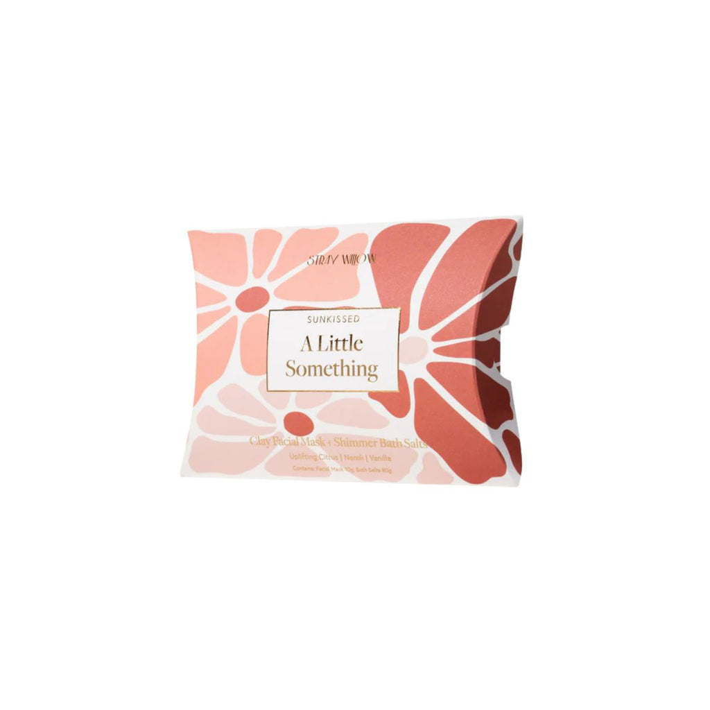 Product packaging with floral design and text on a white background