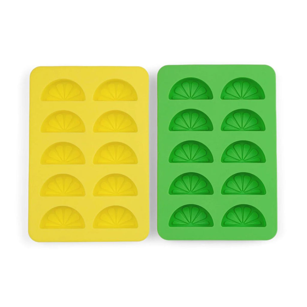 Yellow and green silicone mold trays on a white background