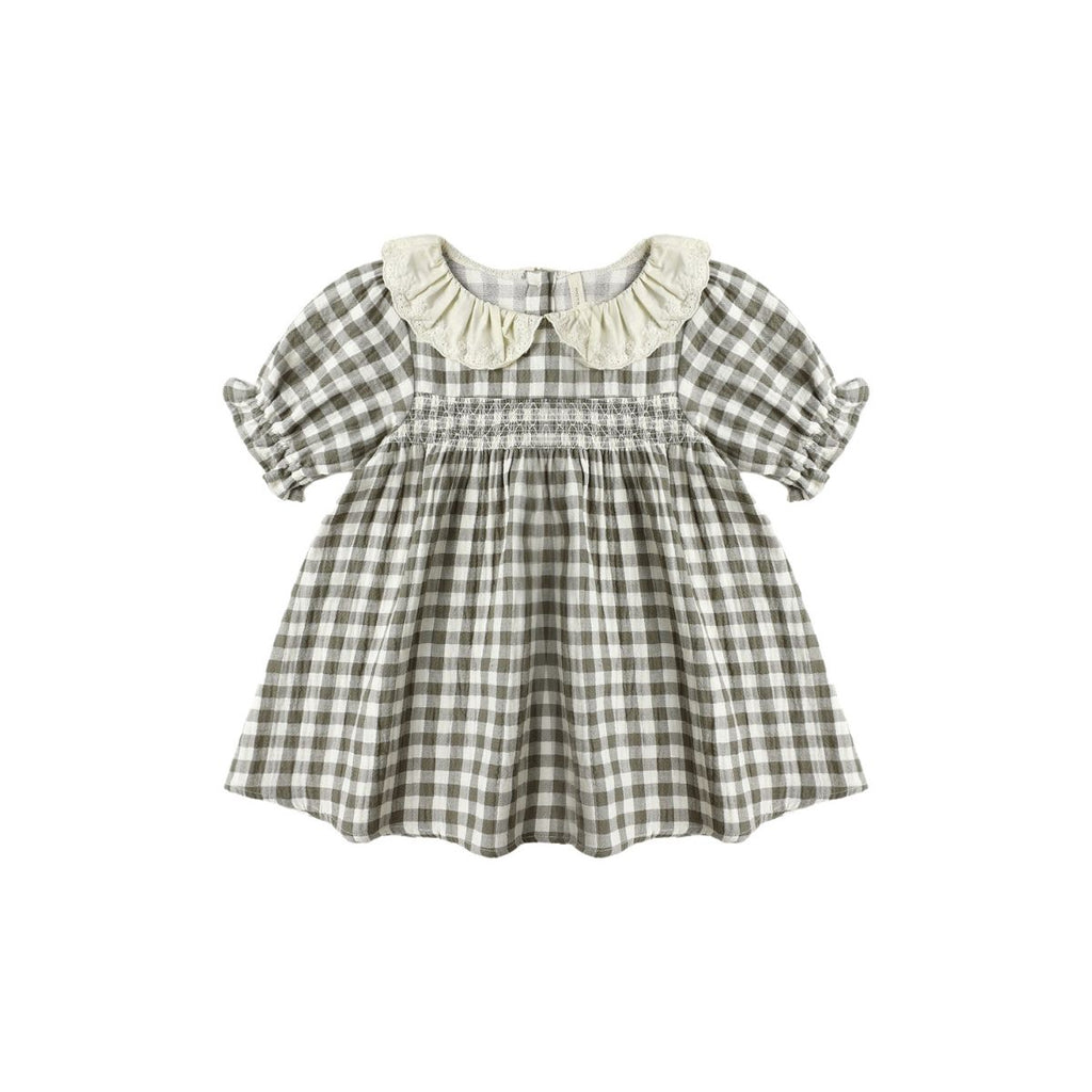 Checkered dress with ruffled collar on a white background