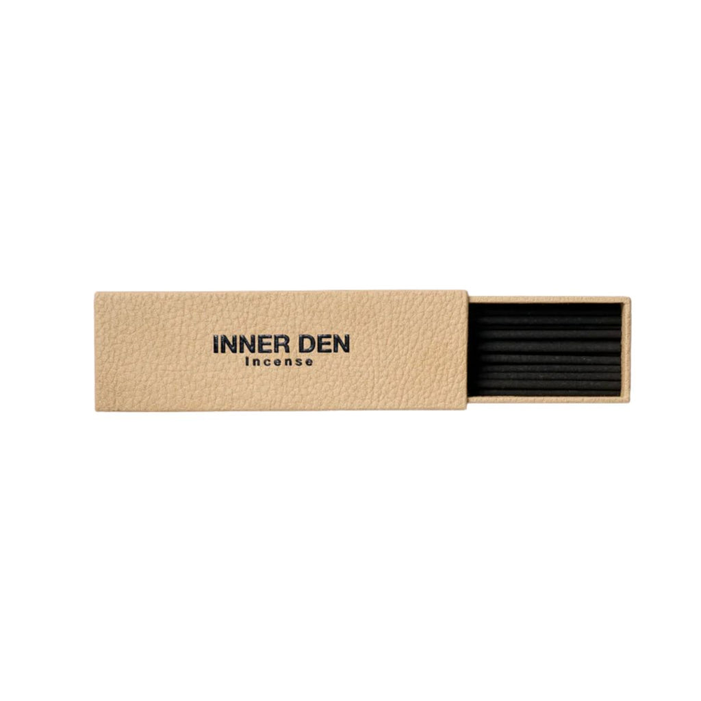 Incense stick box with 'Inner Den' branding on a white background