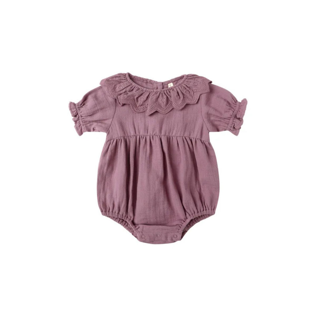 Purple baby romper with ruffled collar on a white background