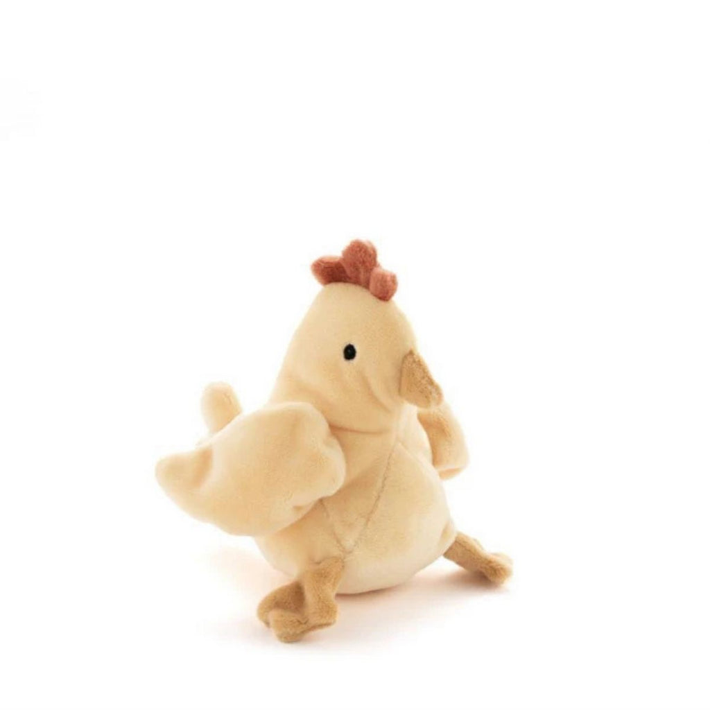 Plush toy chicken with a red comb on a white background