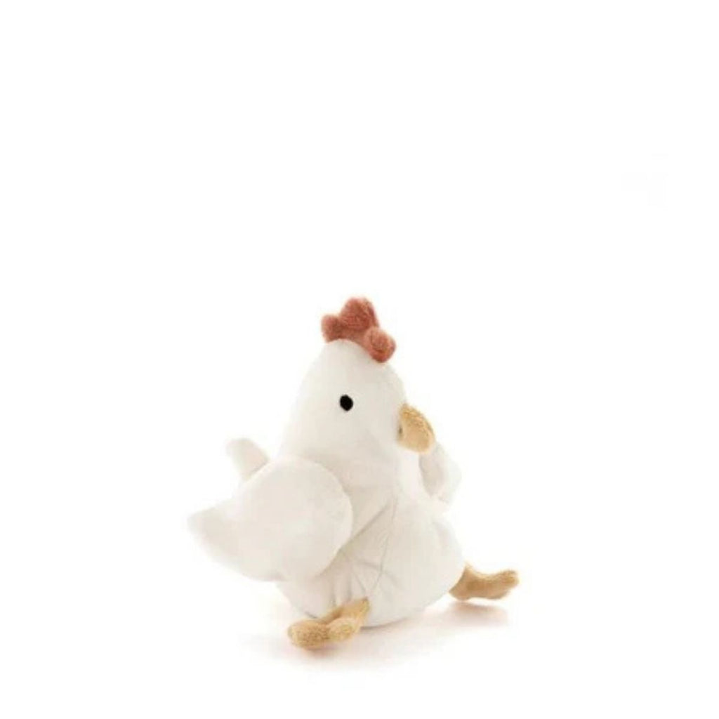 Plush toy chicken on a white background