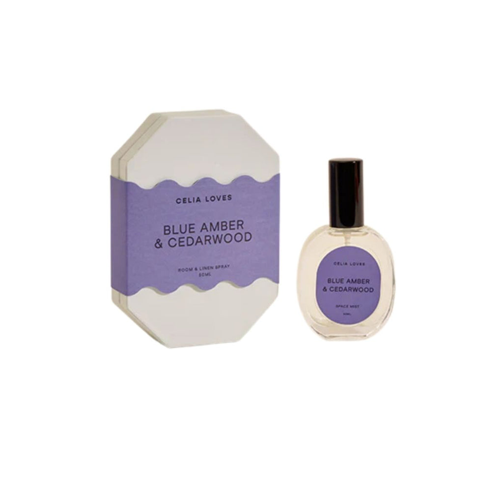 Celia Loves Blue Amber & Cedarwood perfume bottle and packaging on a white background