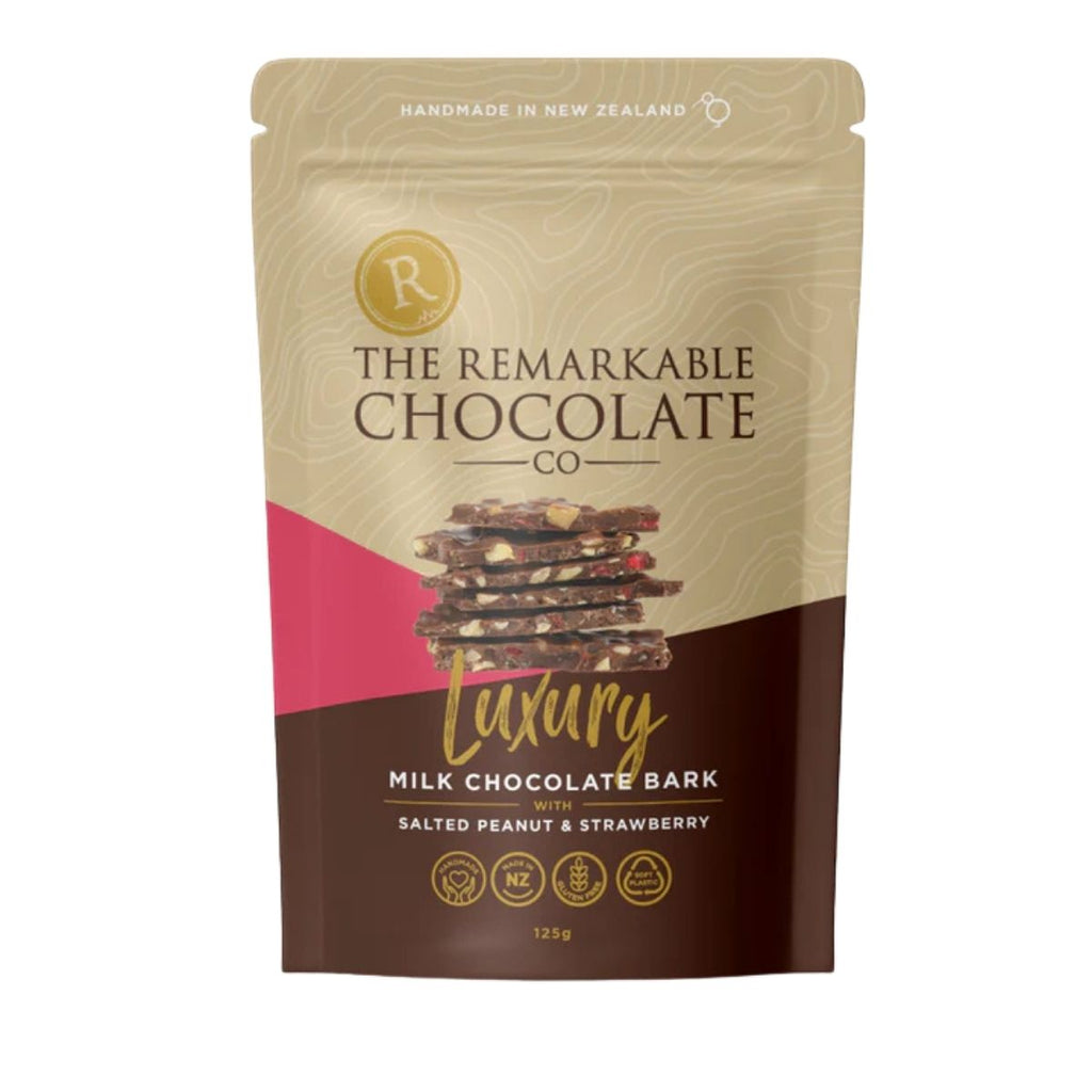 Packaging of The Remarkable Chocolate Co. milk chocolate bark with a beige and brown design.