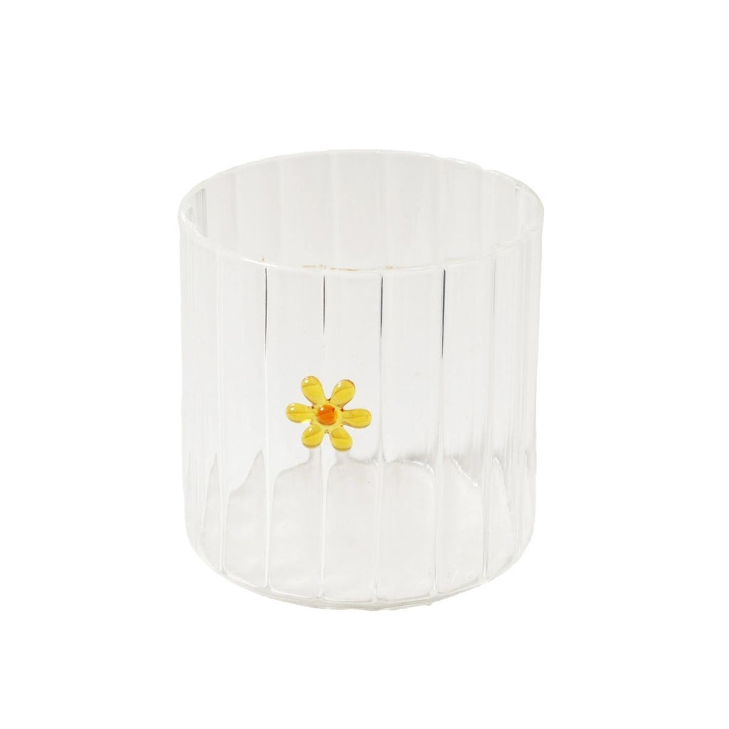 Clear glass vase with a yellow flower on a white background