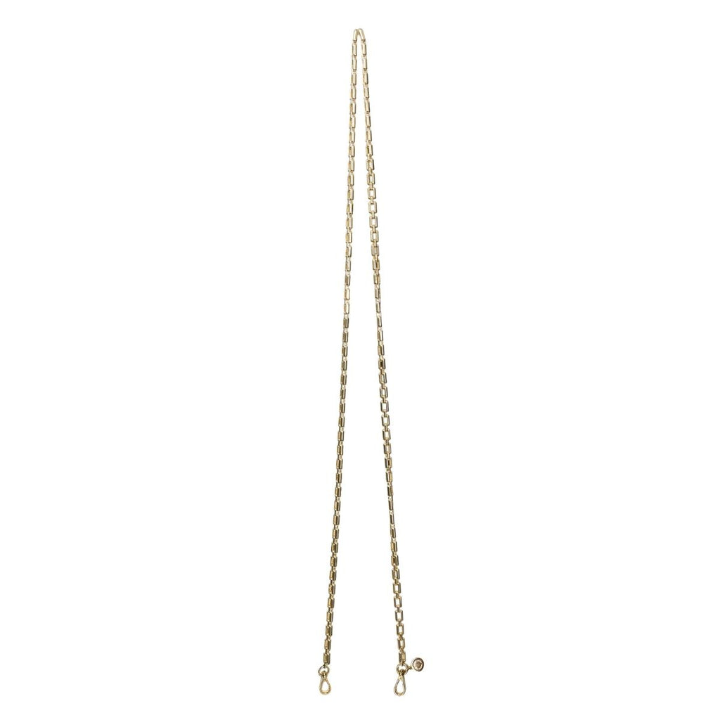 Gold chain for handbag by saben on a white background