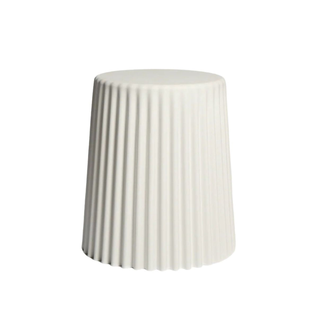 White pleated stool on a white background