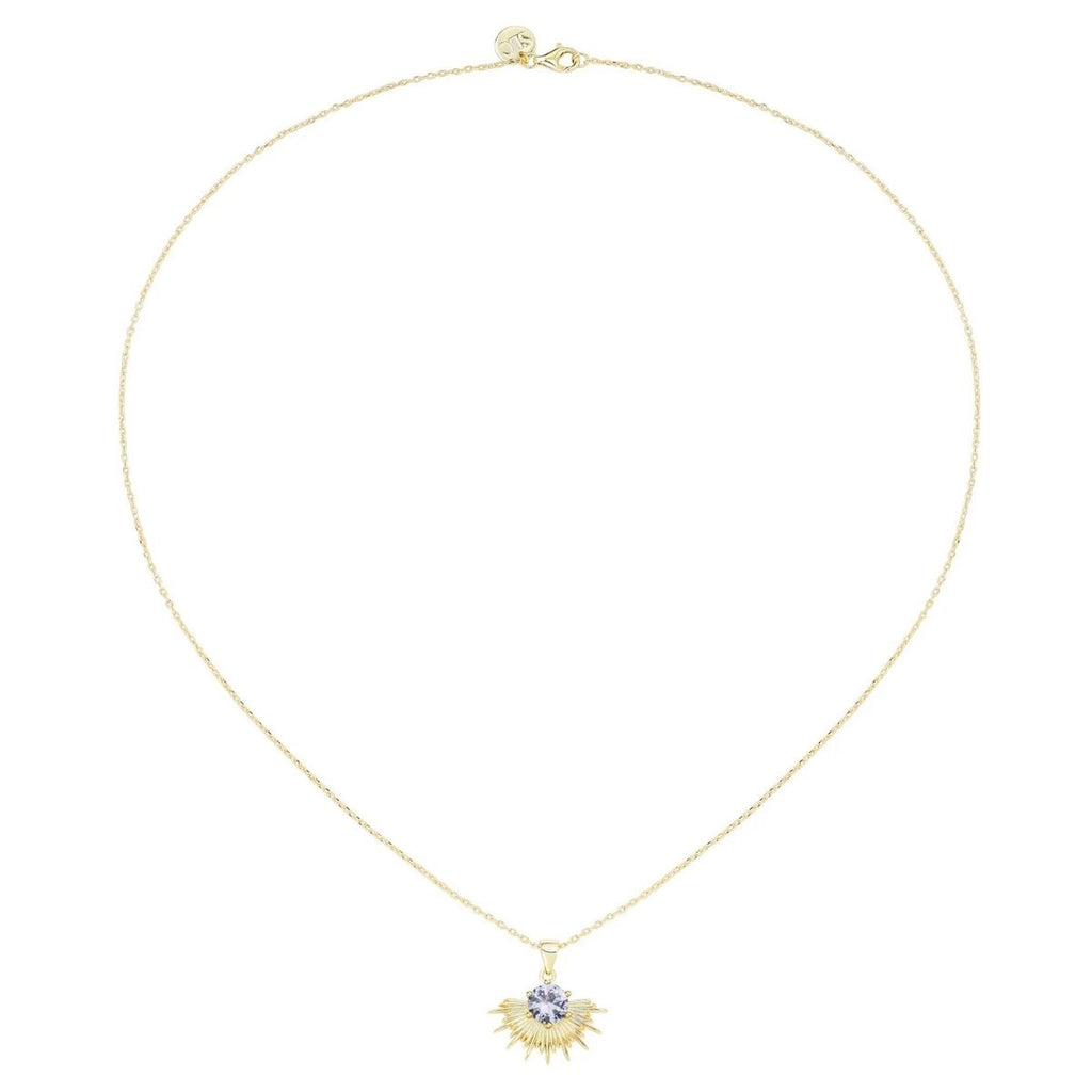 Gold necklace with a pendant on a white background