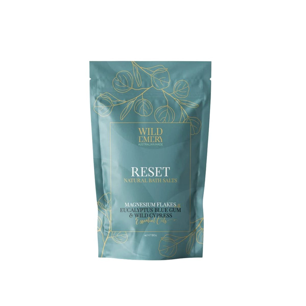 Teal package of Wild Emry Reset natural bath salts on a white background