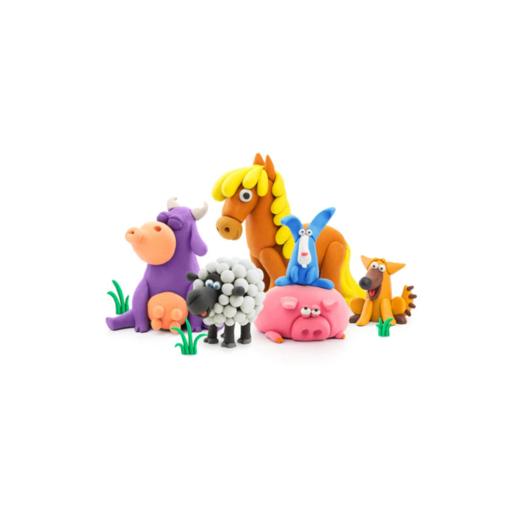 Figurines of farm animals including a cow, sheep, horse, rabbit, pig and dog