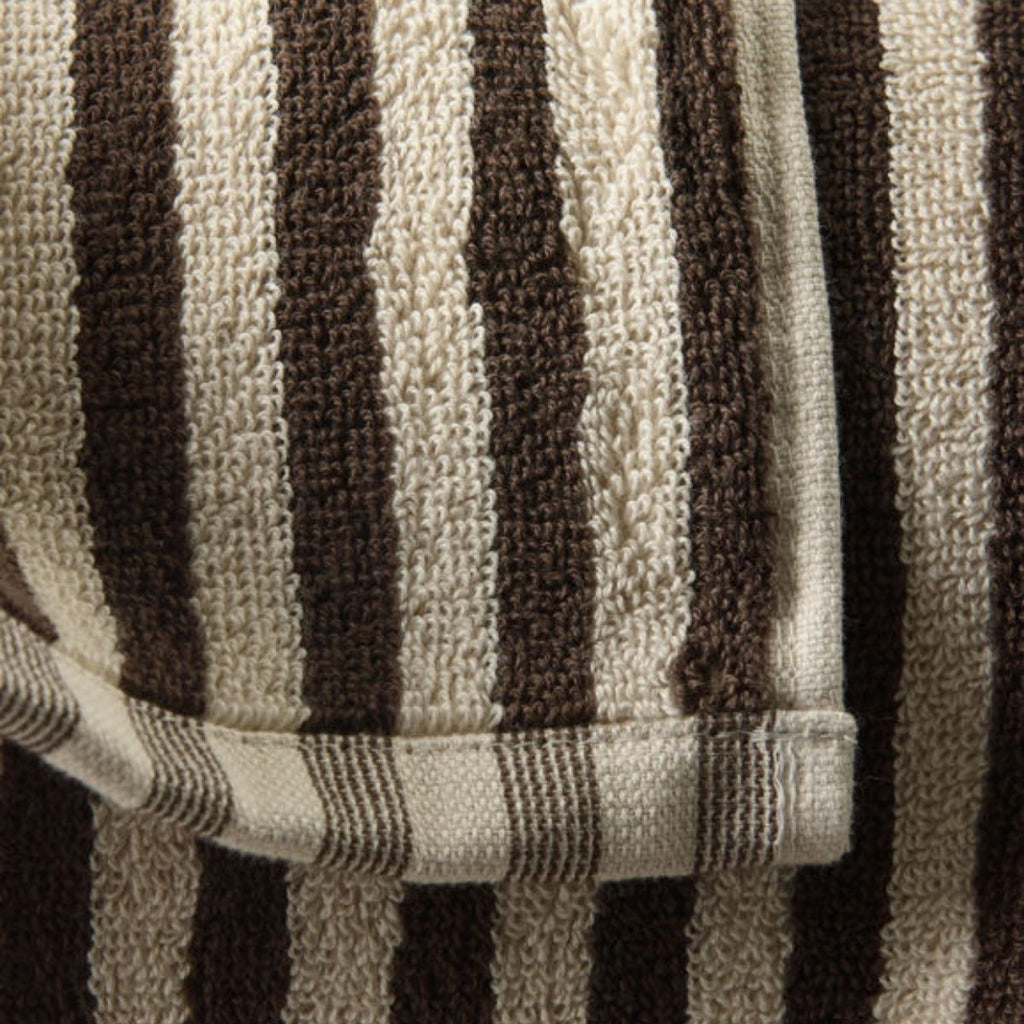 Close-up of a brown and beige striped fabric texture
