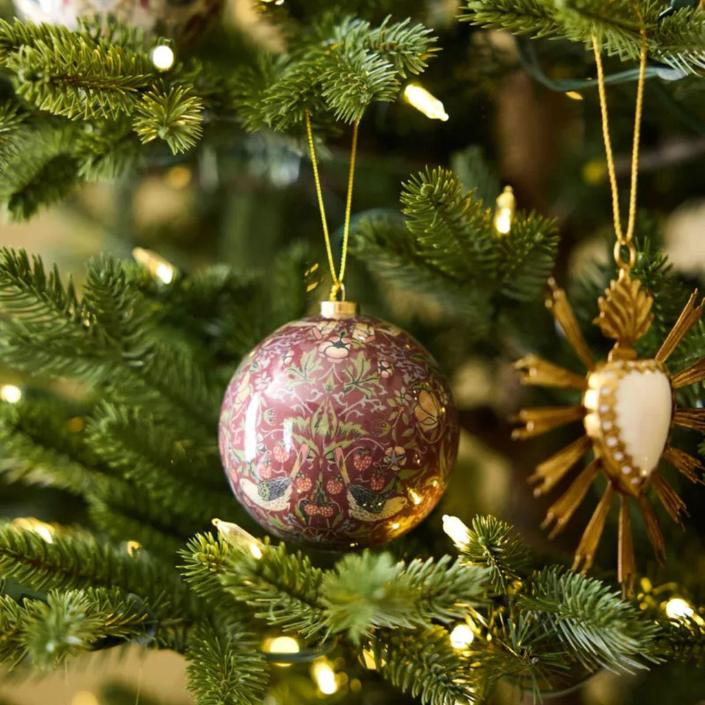 Decorative ornament on a Christmas tree with floral pattern