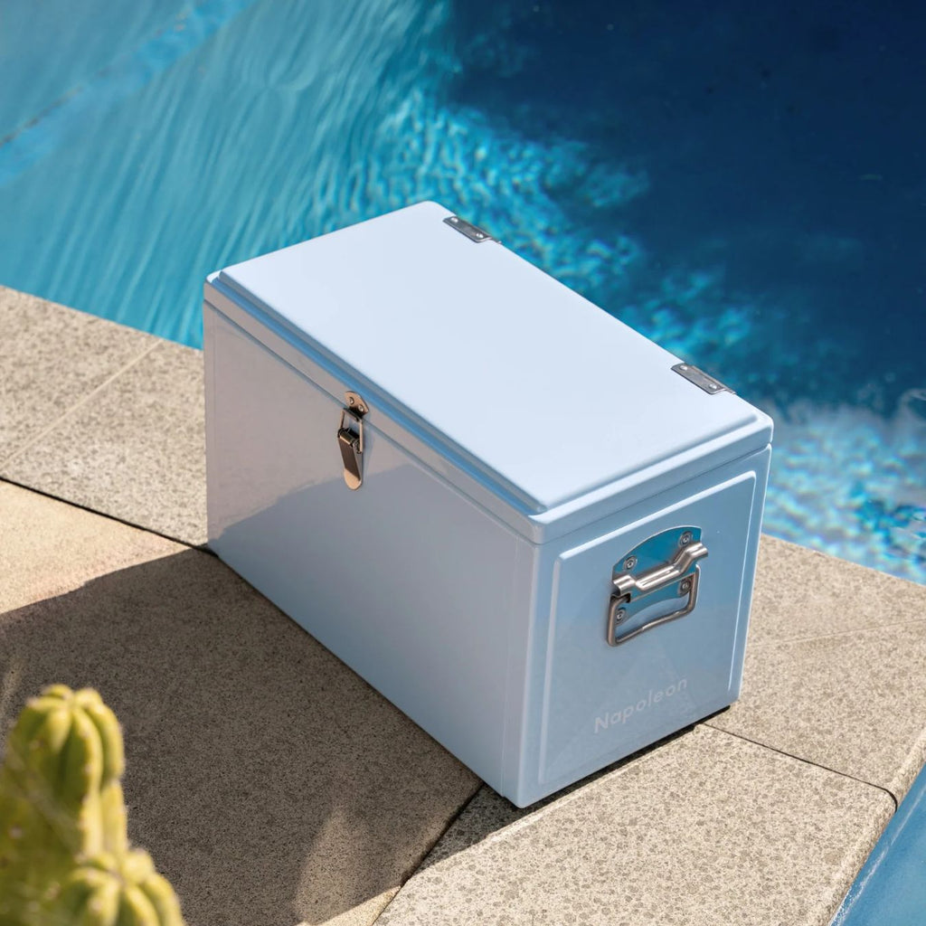 Blue cooler box by a pool
