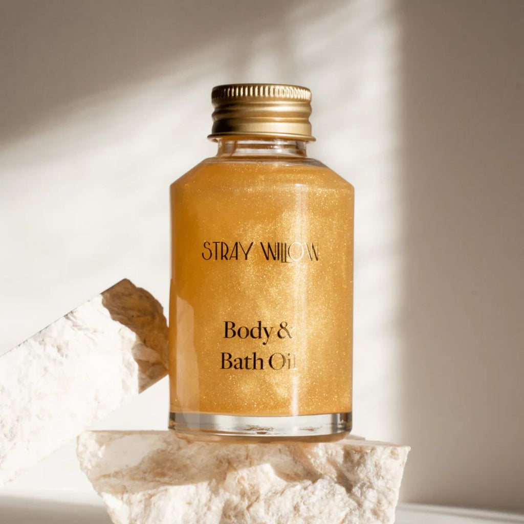 Stray Willow body and bath oil bottle on a light background