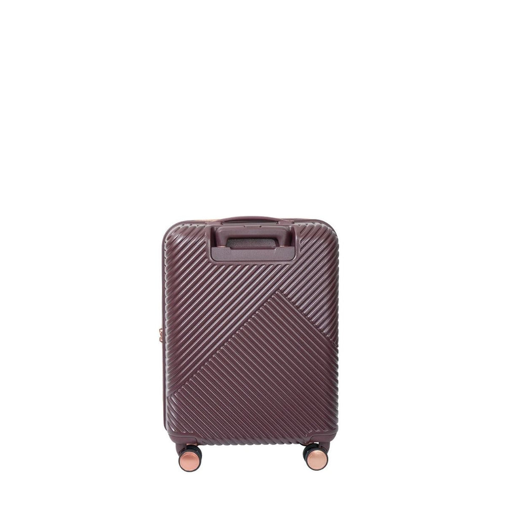 Purple suitcase with a geometric pattern on a white background