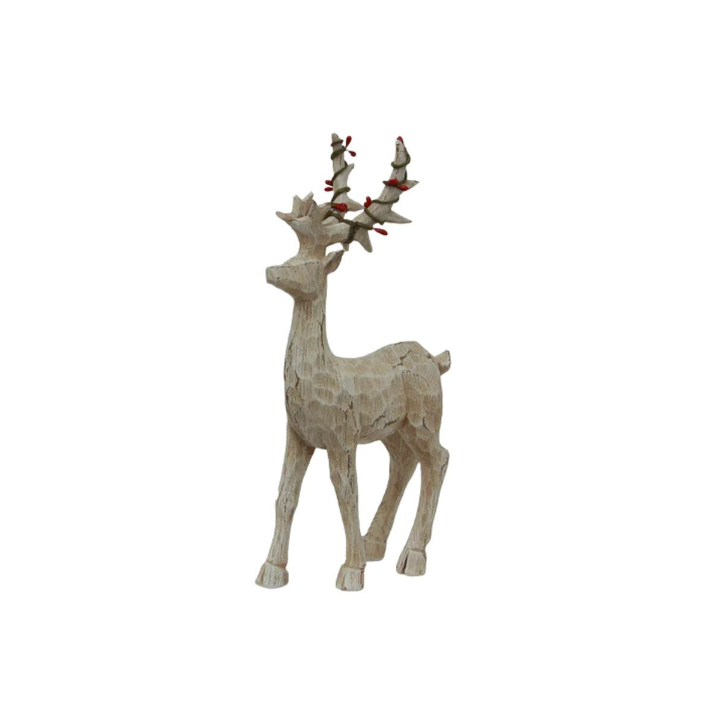 Decorative deer figure with antlers on a white background