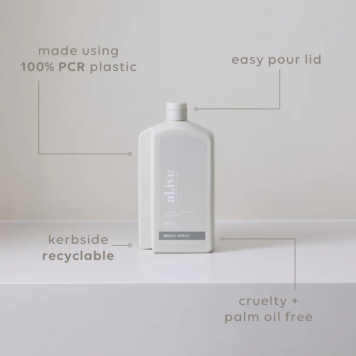 White bottle with text highlighting features on a light gray background