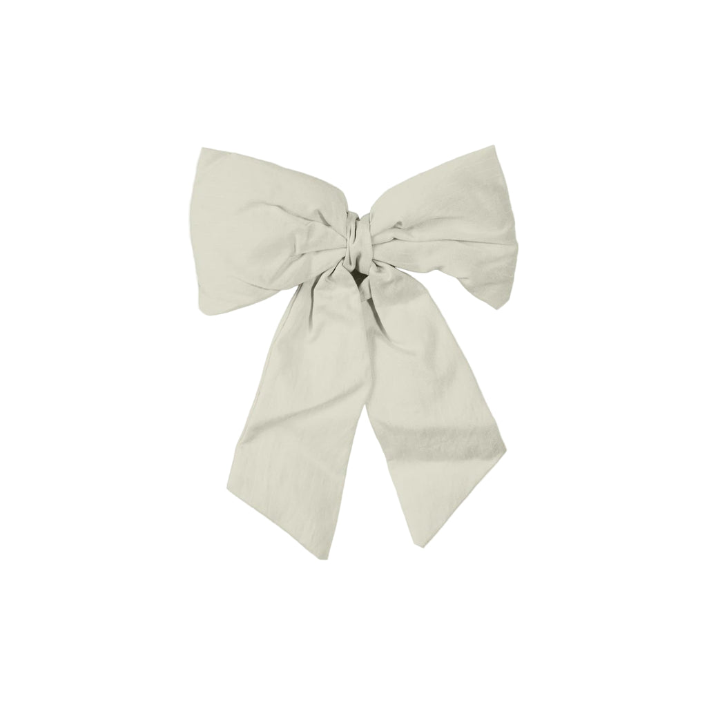 Large beige bow on a light gray background