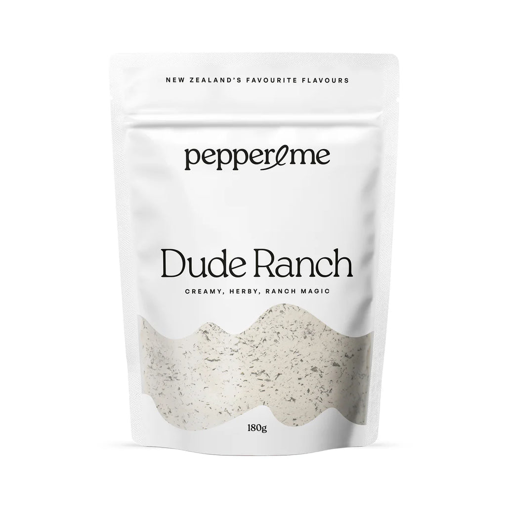 Pepper & me Dude Ranch seasoning packet on a white background