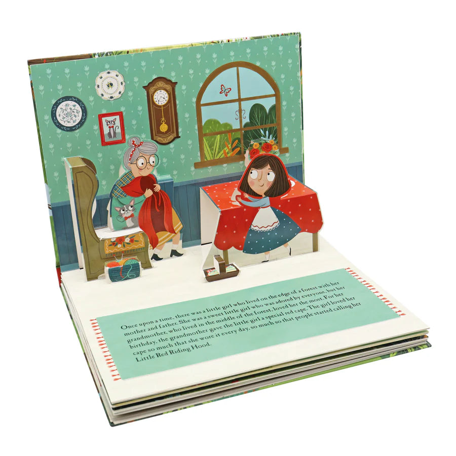 Pop-up book with illustrated characters in a cozy room setting