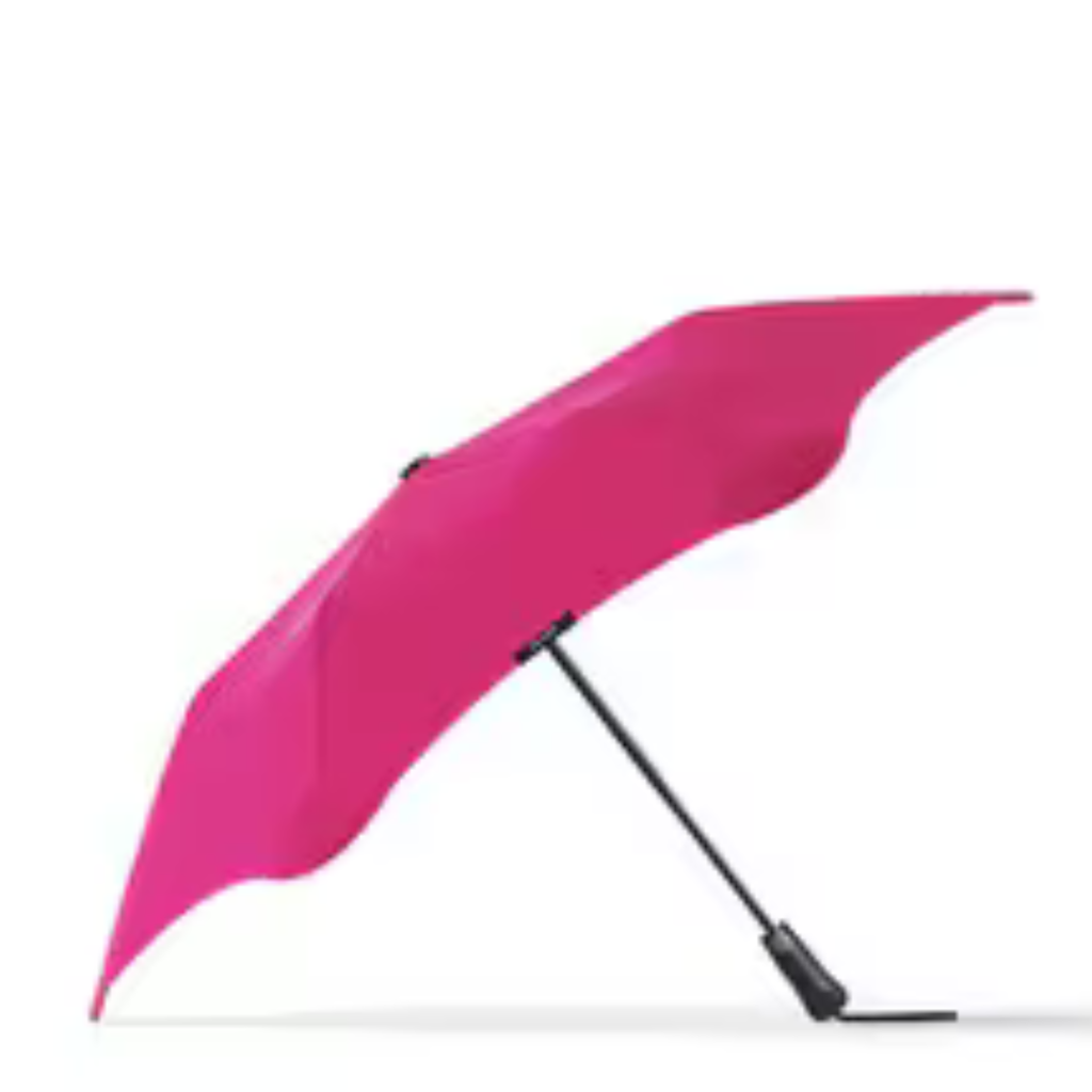 A pink and black handle blunt Metro brand umbrella