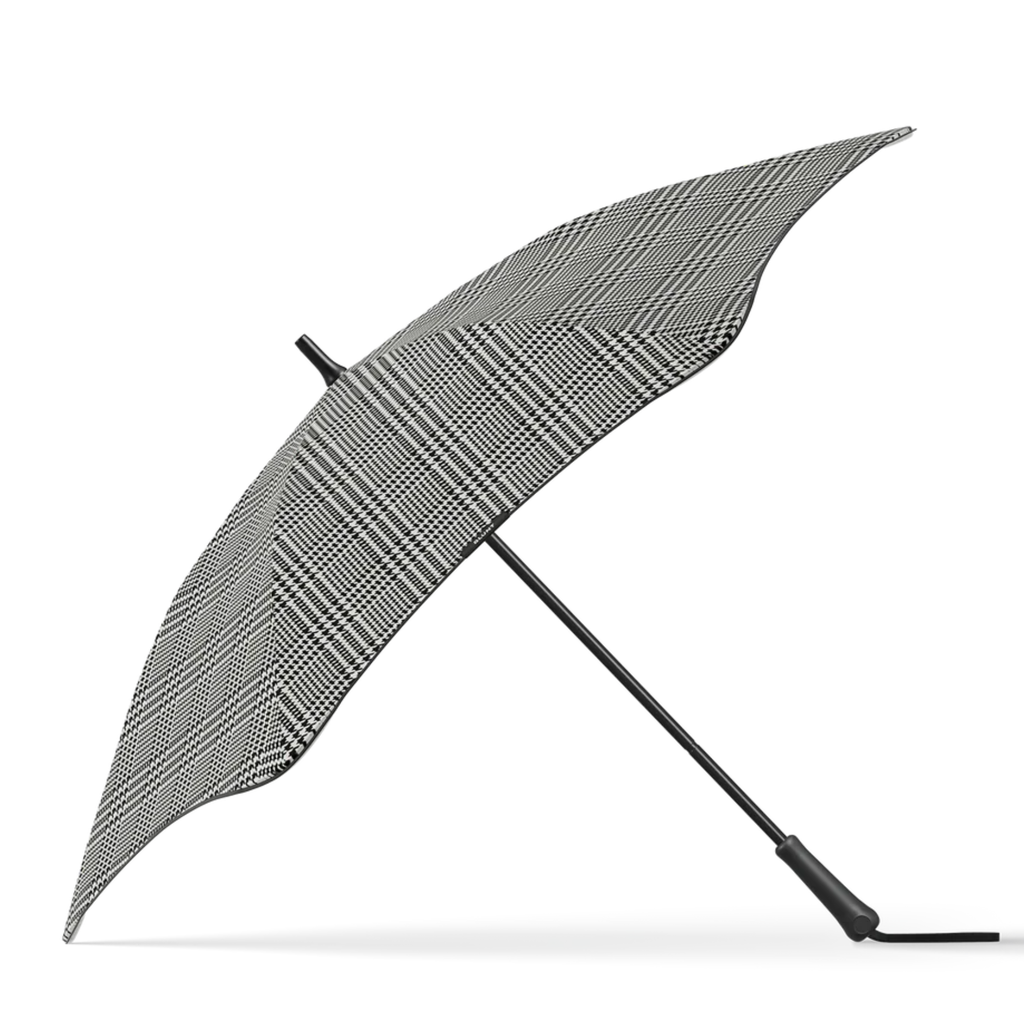 A houndstooth black ad white patterned blunt brand umbrella